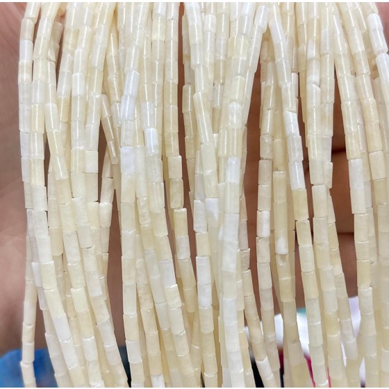 No_1146_Natural Cream Yellow Jade Round Tube_2*4mm_(Sold Per Strand)