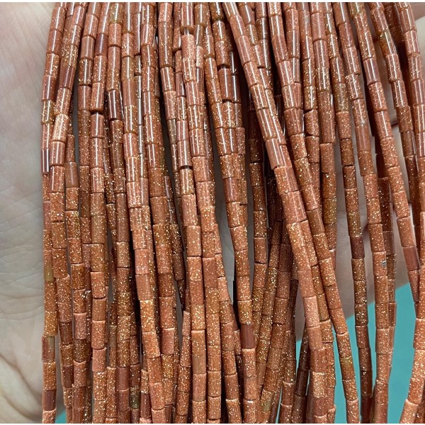 No_1165_Synthetic Goldstone Round Tube_2*4mm_(Sold Per Strand)