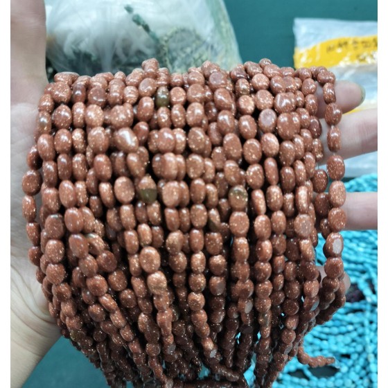 No_337_Synthetic Goldstone Egg Shaped Bead_6*8mm_(Sold Per Strand)