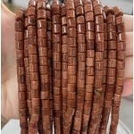 No_442_Synthetic Goldstone Cylinder_6*6mm_(Sold Per Strand)