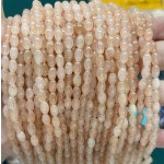 No_581_Enhanced Light Orange Chalcedony Rice Beads_4*6mm_(Sold Per Strand)