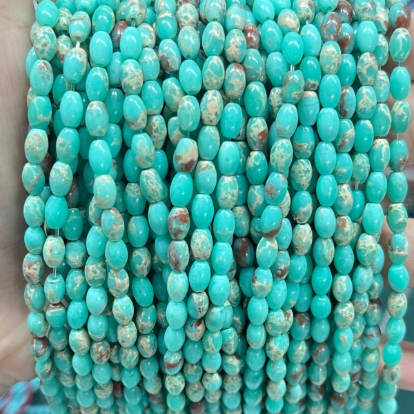 No_607_Synthetic Green Serpentine Seed Beads_4*6mm_(Sold Per Strand)