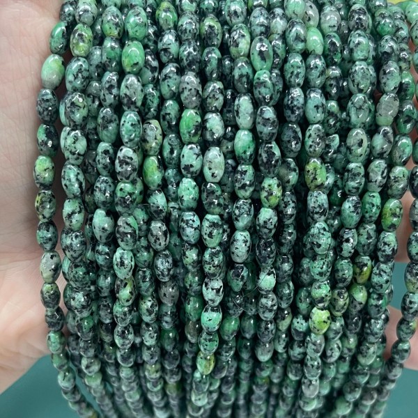 No_628_Enhanced African Turquoise Rice Beads_4*6mm_(Sold Per Strand)