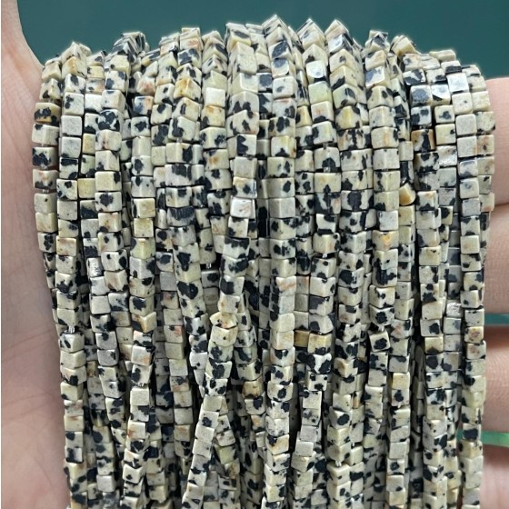 No_803_Natural Dalmation Jasper Small Cubes_2mm_(Sold Per Strand)