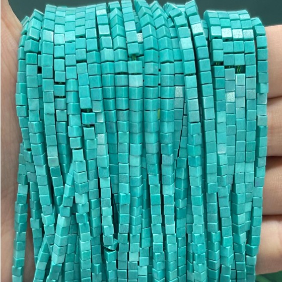 No_829_Synthetic Lake Green Stone Small Cubes_2mm_(Sold Per Strand)