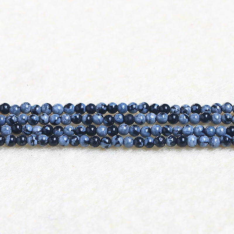 No_4539_Natural Snowhlake Beads_2mm_(Sold Per Strand)